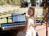 Laura with Stage Piano at Wedding Service
